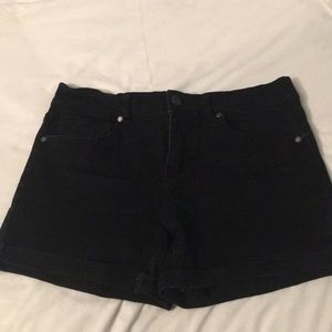Black stretch denim shorts